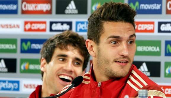 Koke e Javi Martínez podem ser titulares (Foto: Orlando Kissner/ AFP)