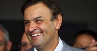 Na sua volta ao Senado após a derrota pela disputa à Presidência Aécio condicionou o estabelecimento de um diálogo com o governo Dilma Rousseff