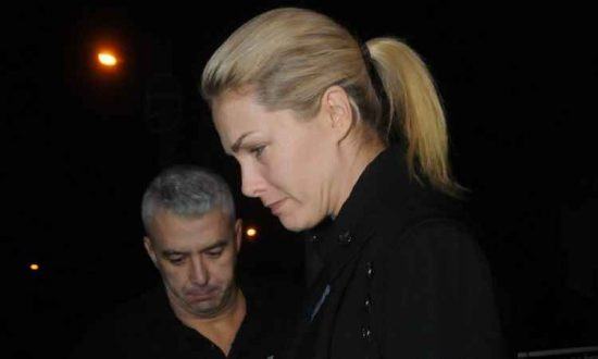 Ana Hickmann e o marido Alexandre Corrêa na saída da delegacia em BH